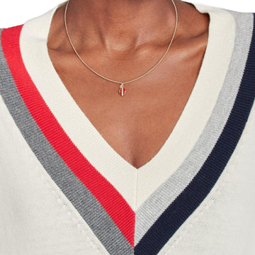 Γυναικείο κολιέ Tommy Hilfiger σε ροζ χρυσό χρώμα, με στρογγυλό μοτίφ από κόκκινο φίλντισι.